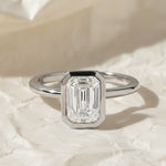 Load image into Gallery viewer, 2 Carat F Color VS1 Clarity IGI CERTIFIED Emerald Cut Lab Grown Diamond Bezel Set Solitaire Engagement Ring 14k Yellow Gold