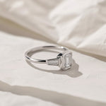 Load image into Gallery viewer, Lab Grown Emerald Cut Diamond Engagement Ring 2 Carat VS1 F Color 14K Gold Bezel Set with Trapezoid Side Stones