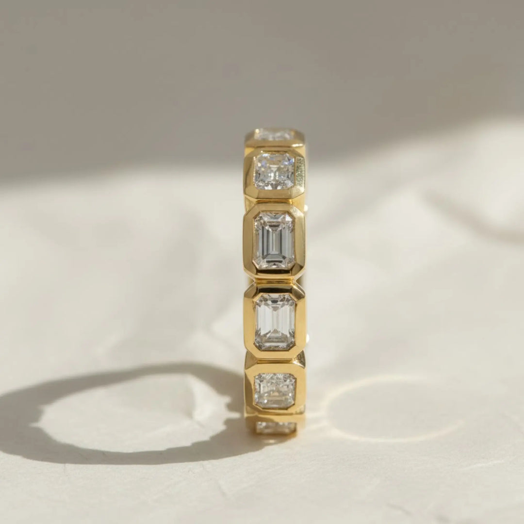 Emerald Cut Lab Grown Diamond Eternity Ring, 14K Yellow Gold Bezel Set Jwalin Jewels