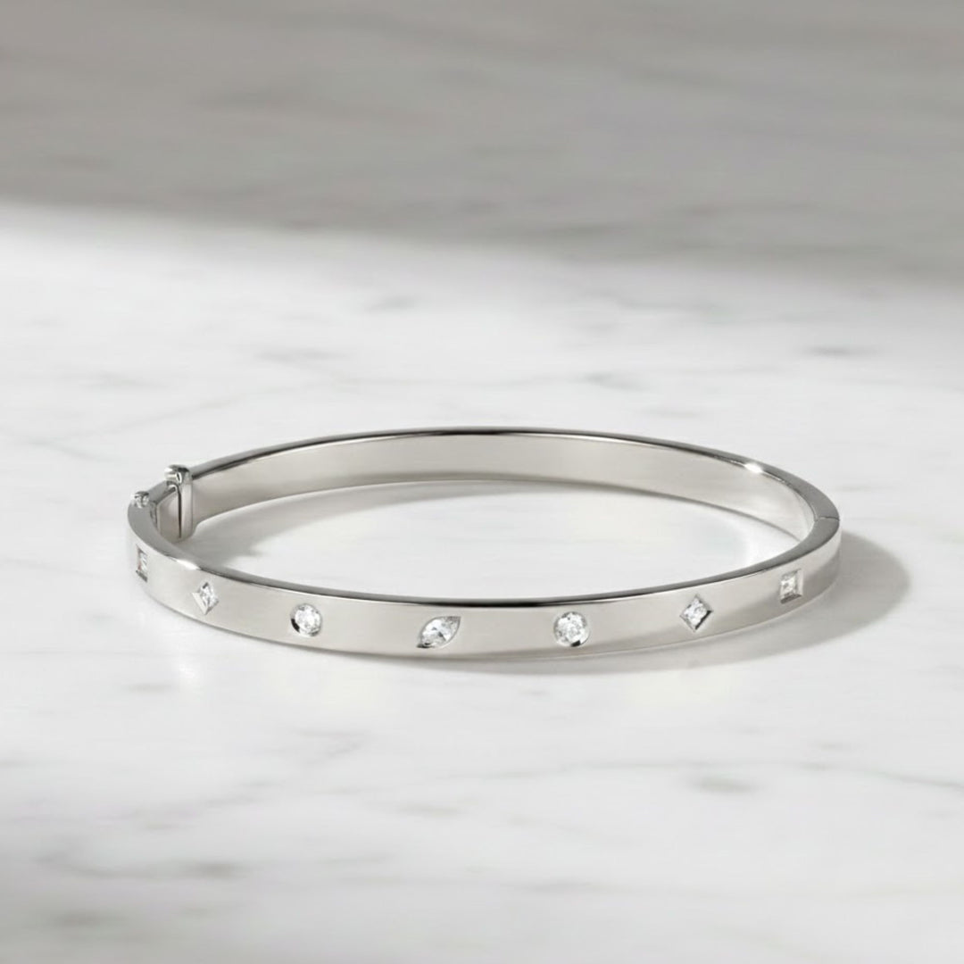 Flush Set Diamond Bangle Bracelet - 0.49 Carat Weight VS1 Diamonds. 14K Yellow Gold Diamond Bangle Bracelet: Flush Set Multi Shape Cut Stone