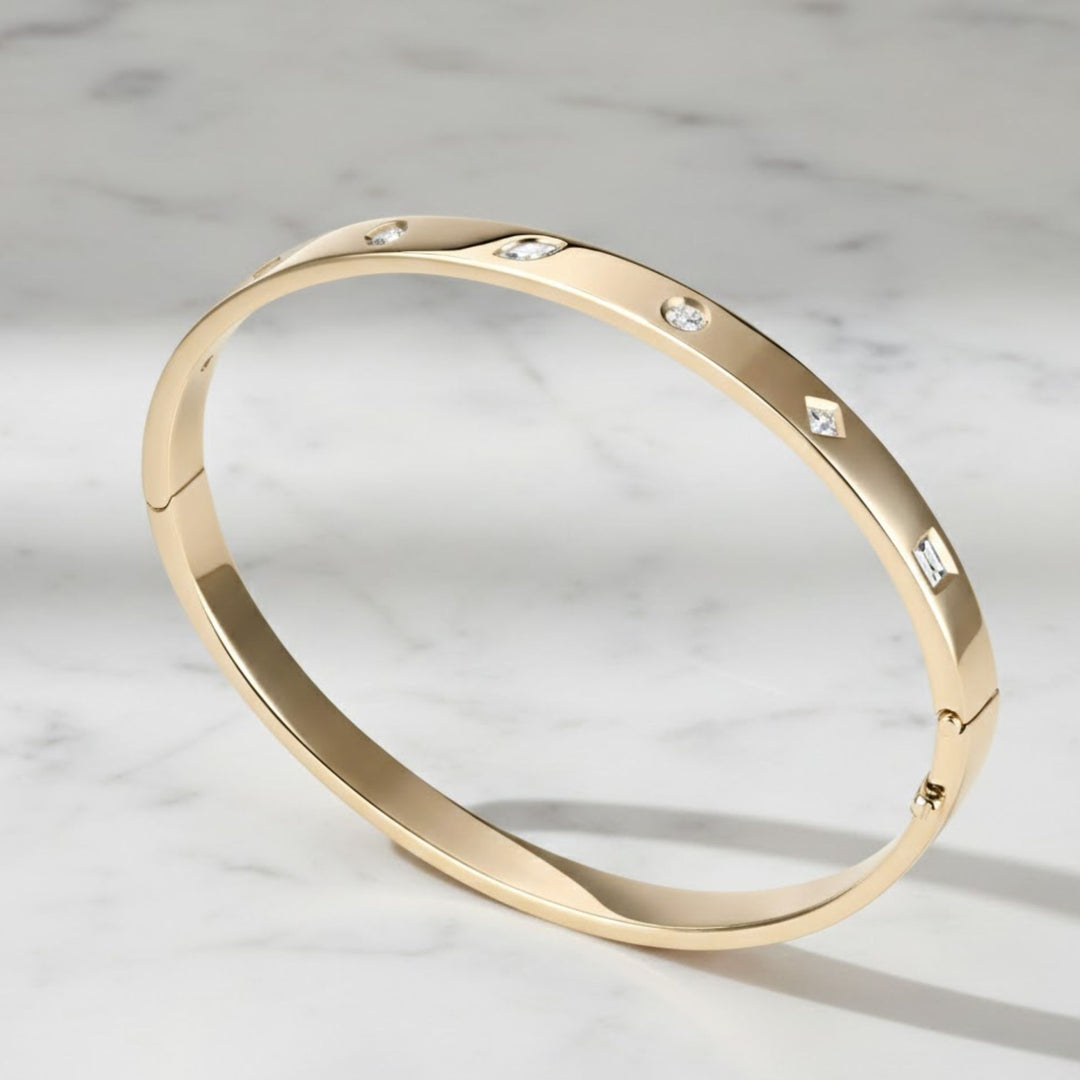 Flush Set Diamond Bangle Bracelet - 0.49 Carat Weight VS1 Diamonds. 14K Yellow Gold Diamond Bangle Bracelet: Flush Set Multi Shape Cut Stone