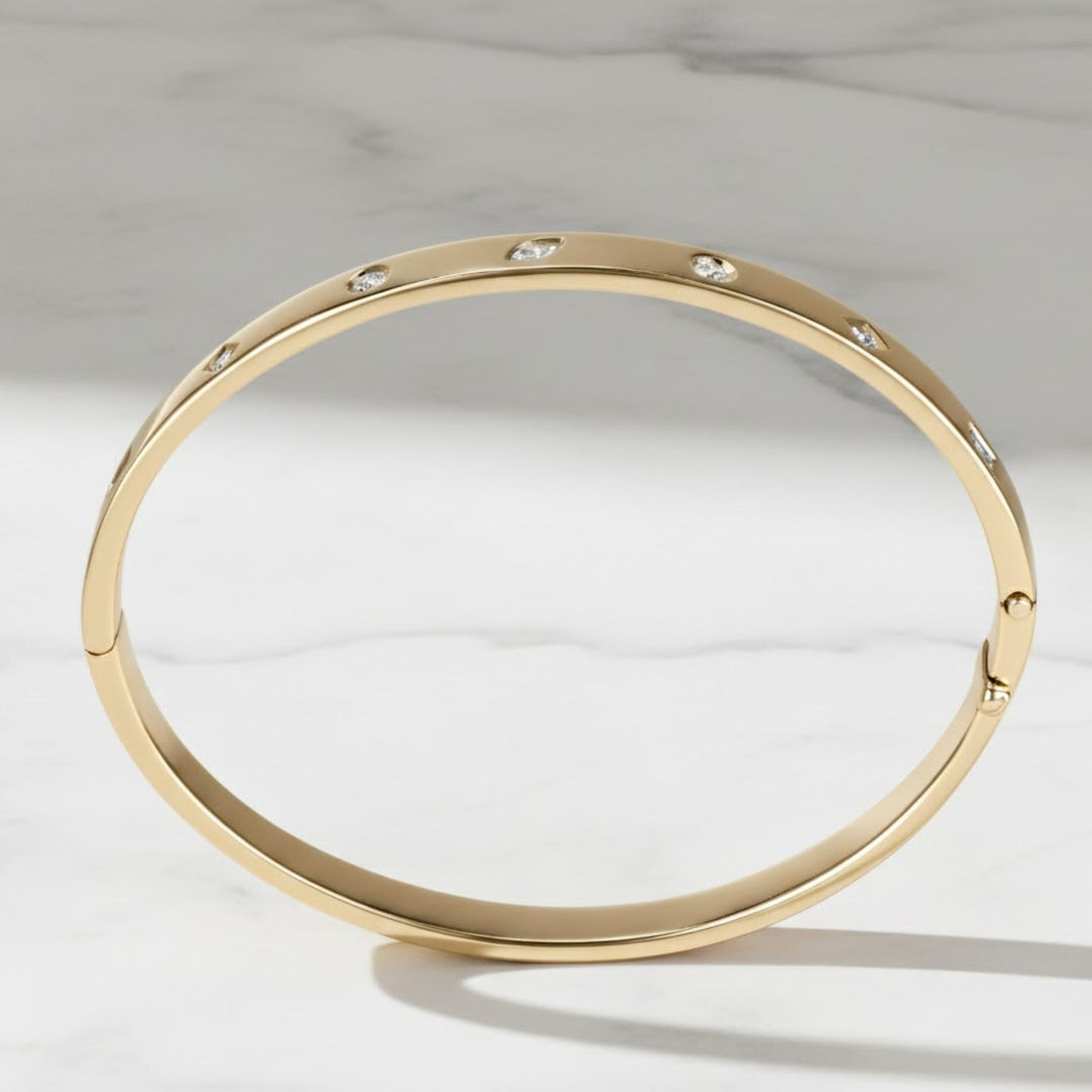 Flush Set Diamond Bangle Bracelet - 0.49 Carat Weight VS1 Diamonds. 14K Yellow Gold Diamond Bangle Bracelet: Flush Set Multi Shape Cut Stone