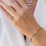 Load image into Gallery viewer, Dainty Pear Diamond Gold Cuff Bracelet | 14K Yellow Gold, Bezel Set Lab Grown Stone, VS+ Clarity, 0.30 CT, Bridal, Stacking, Gift for Women Jwalin Jewels