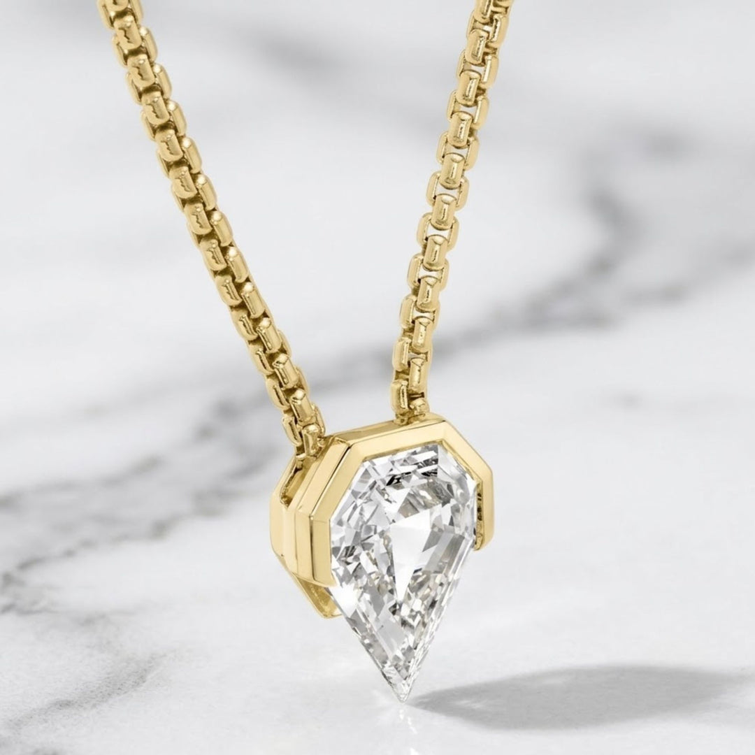 Solitaire Shield Diamond Pendant Necklace 14k White Gold, Diamond Profile 0.75 Carat, F+ Color, tension bead, IGI certified