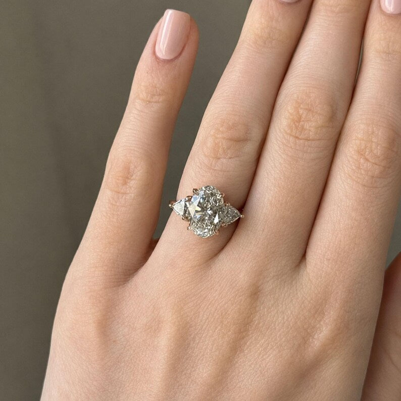 Elegant 3.00 CT Oval Lab Grown Diamond Engagement Ring with Trillion Accents