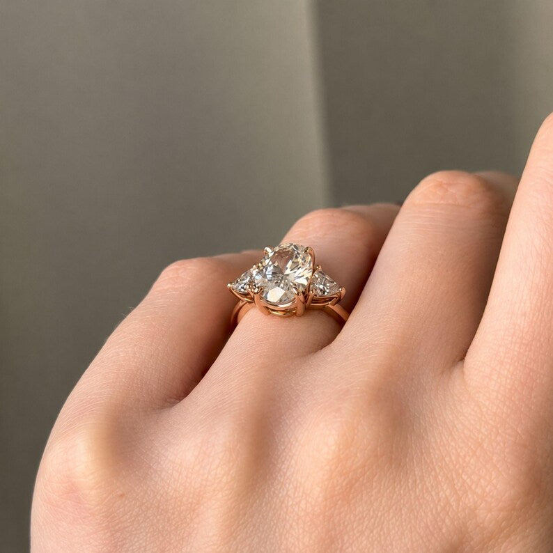 Elegant 3.00 CT Oval Lab Grown Diamond Engagement Ring with Trillion Accents